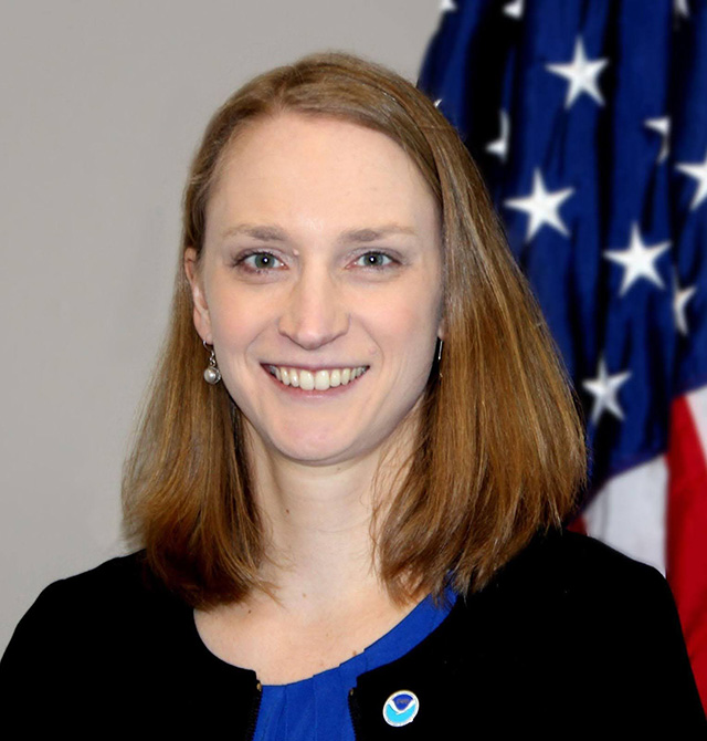 Photo Portrait of Monica Youngman with US flag background