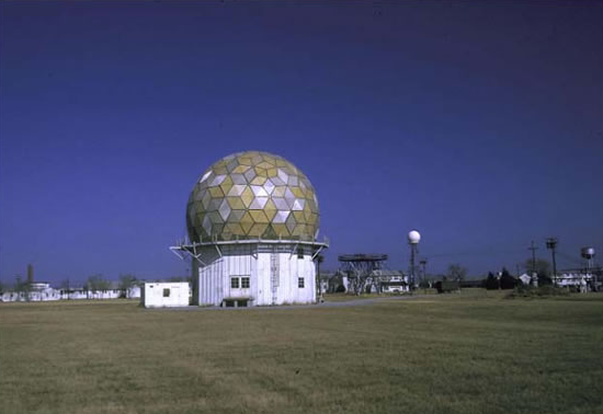 Research Doppler radar near Norman, OK in 1970, with WSR-57 radar seen to the right. (National Severe Storms Laboratory photo)