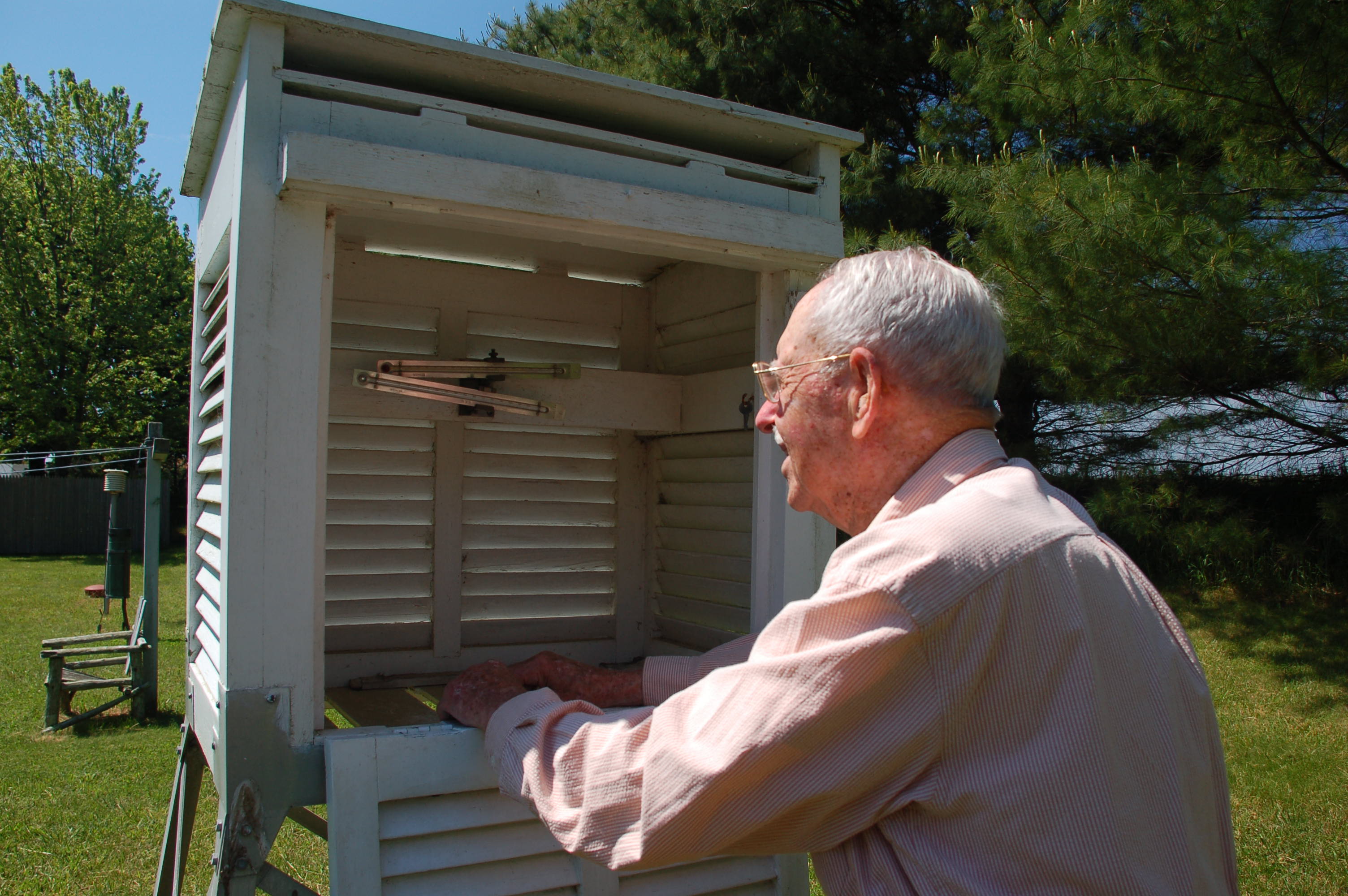 Richard G. Hendrickson taking weather observations at his farm in Bridgehampton, New York (2008).